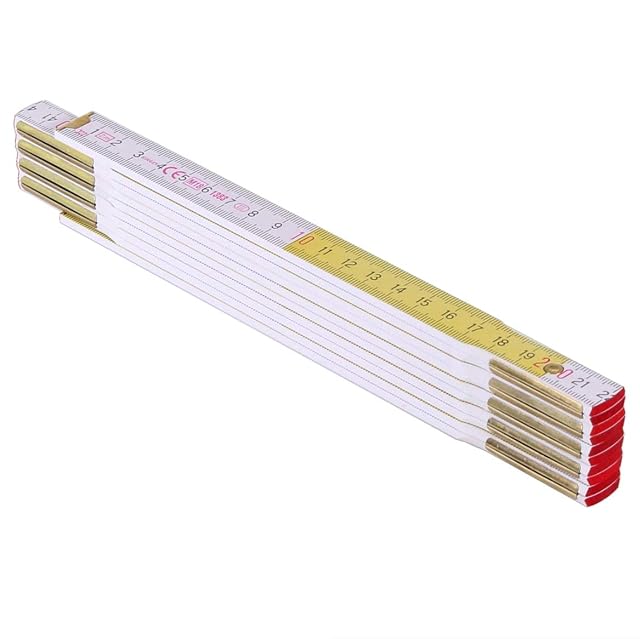 Stanley wooden folding rule partly unfolded, showing its brass joints and white-yellow scale