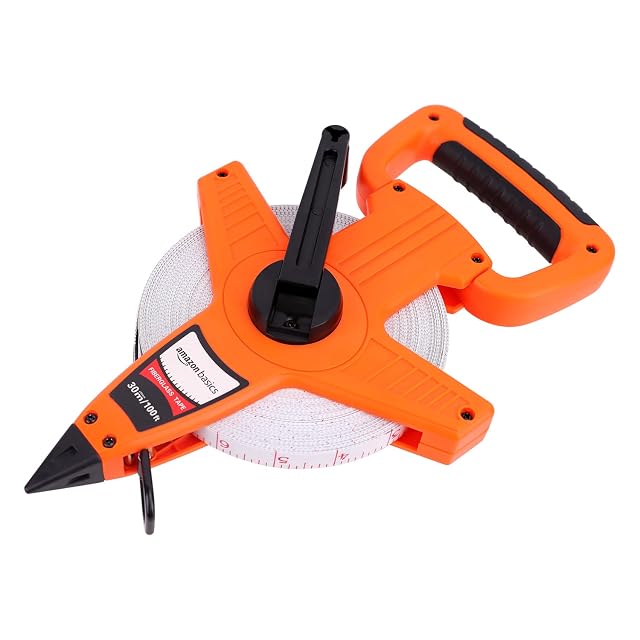 Amazon Basics orange open-reel measuring tape with its fiberglass band and end hook
